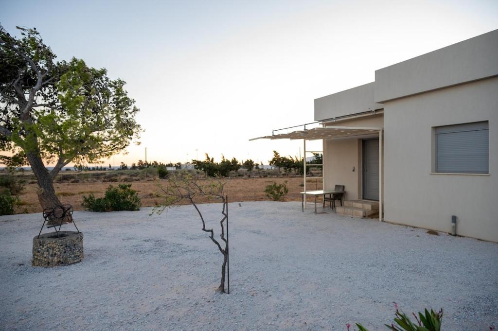 Villa Akalli beachfront exterior with sea views and Frangokastello fortress in background